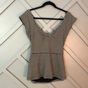 Deletta Knit Peplum Blouse with Open Back Detail